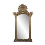 A LARGE GILTWOOD AND GESSO PIER MIRROR, 19TH CENTURY, headed with a scrollwork cartouche, filled