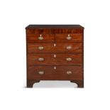 A GEORGE IV MAHOGANY RECTANGULAR CHEST OF DRAWERS the figured top above two short and three long