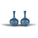 A PAIR OF PERSIAN TURQUOISE GLAZED BOTTLE VASES, 19TH CENTURY, the tapering necks painted with