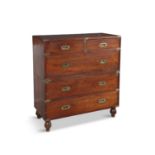 A MAHOGANY AND BRASS BOUND CAMPAIGN CHEST, EARLY 19TH CENTURY with two short drawers above one