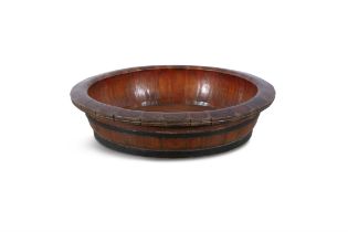 A STAINED WOOD AND METAL BOUND SHALLOW BASIN. 74cm diameter, 17.5cm high