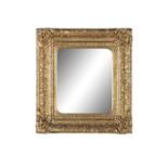 A VICTORIAN GILTWOOD AND GESSO PICTURE FRAME, fitted with plain mirror glass plate. 55 x 50cm