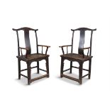 A PAIR OF CHINESE ELMWOOD YOKE BACK SIDE CHAIRS, LATE 19TH CENTURY, each with wavy top rim and solid