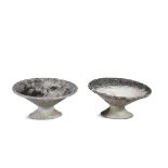 A PAIR OF STONE PLANTERS, of tilted cone form, raised on circular spreading foot. Each 64cm