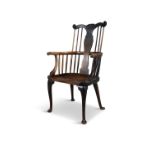 A GEORGE III ASH AND ELM WINDSOR CHAIR, THAMES VALLEY, C.1800 with shaped toprail centred with a