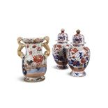 A LARGE VICTORIAN MASON'S IRONSTONE TWO HANDLED URN, in the Imari palette, applied with
