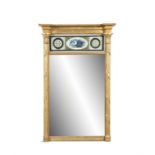 A REGENCY GILDED AND VERRE ÉGLOMISÉ PIER MIRROR, of upright rectangular form, with moulded cornice