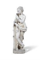 A COMPOSITE STONE FIGURE OF A SEMI-NUDE DRAPED FEMALE. 91cm high