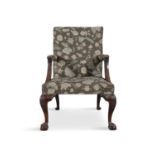 A GEORGE III MAHOGANY FRAMED GAINSBOROUGH ARMCHAIR, the square back and seat upholstered in green