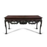 A 19TH CENTURY IRISH MAHOGANY SIDE TABLE, the rectangular top with moulded rim, above plain