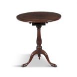 A 19TH CENTURY MAHOGANY CIRCULAR SNAP TOP TABLE, the circular tilt-top above baluster column, raised