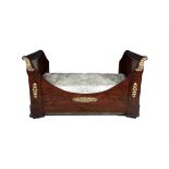 AN EMPIRE STYLE MAHOGANY SINGLE 'SLEIGH' BED, the sides decorated with applied cast brass foliate