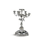 A 19TH CENTURY SEVEN BRANCH SILVER PLATED CANDELABRA IN THE FORM OF A FRUITING VINE, raised on