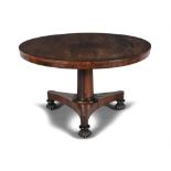 A WILLIAM IV ROSEWOOD CIRCULAR BREAKFAST TABLE, raised on turned centre pillar and tripod base on