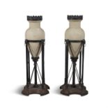 A PAIR OF AMPHORA SHAPED ALABASTER FLOOR LIGHTS 20TH CENTURY on metal stands. 81cm high, and a