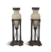 A PAIR OF AMPHORA SHAPED ALABASTER FLOOR LIGHTS 20TH CENTURY on metal stands. 81cm high, and a