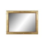 A CONTINENTAL GILTWOOD OVERMANTLE MIRROR, LATE 19TH CENTURY fitted with plain rectangular plate,