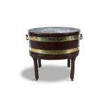 A GEORGE III MAHOGANY AND BRASS BOUND OVAL WINE COOLER ON STAND, of coopered construction with