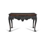 A FINE IRISH MAHOGANY GEORGE III HALL TABLE, C.1740 the moulded top above an apron carved with a