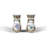 A PAIR OF CHINESE 'CAFE AU LAIT' FAMILLE ROSE VASES, 19TH CENTURY, colourfully enamelled with flower