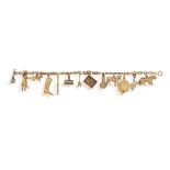 A 9CT GOLD, CHARM BRACELET With various charms the majority of which are 9ct gold,