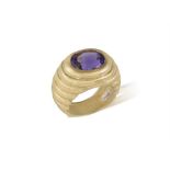 AN 18CT GOLD AMETHYST RING oval, mixed-cut amethyst ring, Of bombe design, set with an oval,