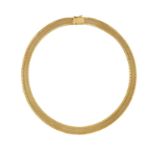 AN 18CT GOLD, OMEGA-LINK NECKLACE With wide, textured links and diagonally engraved decorative