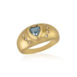 AN 18CT GOLD BLUE TOPAZ AND DIAMOND RING Of bombe design, the heart-shaped blue topaz with