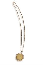 A SOUTH AFRICAN GOLD KRUGERRAND PENDANT, 1974 within a beaded circular bezel and suspended on a