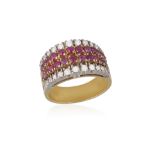 AN RUBY AND DIAMOND RING Of bombe design, the two central lines of round, mixed-cut rubies,