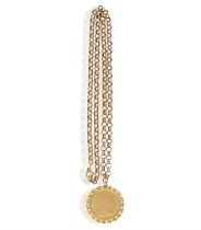 A SOUTH AFRICAN GOLD ½ KRUGERRAND PENDANT, 1981 Within a twisted ribbon circular bezel and