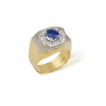 AN 18CT GOLD, SAPPHIRE AND DIAMOND RING Of bi-colour design, the broad undulating band,