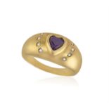 AN 18CT GOLD AMETHYST AND DIAMOND RING Of bombe design, the heart-shaped amethyst with