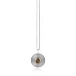 A SILVER, SMOKEY QUARTZ PENDANT BY RUDOLF HELTZEL Of textured, disc form, centrally set with a