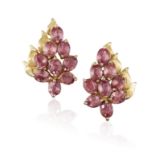 A PAIR OF SAPPHIRE EAR STUDS The sapphires of orangey pink hue, the ear studs of floral design,