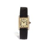 A GOLD-PLATED 'MUST DE CARTIER' TANK WRISTWATCH Manual movement, the rectangular,