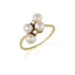 AN 18CT GOLD, CULTURED PEARL AND DIAMOND RING Of cross-over design, alternatingly set with four