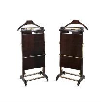 FRATELLI REGUITTI A pair of valet stands by Fratelli Reguitti with brass detailing. Italy, c.1960.