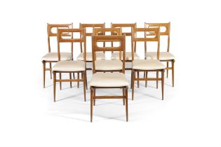 DINING CHAIRS A set of eight dining chairs in the style of Carlo de Carli. Italy, c.1950.