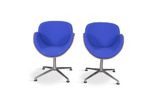 SWIVEL CHAIRS A pair of 'Spirit' upholstered swivel tub chairs with oak outer shell,