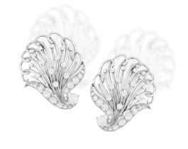 A PAIR OF DIAMOND BROOCHES, BY TEMPLIER, CIRCA 1955 Of swirled foliate openwork design,