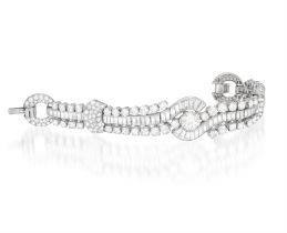 AN IMPORTANT DIAMOND BRACELET, CIRCA 1935, The articulated band centring a European-cut diamond