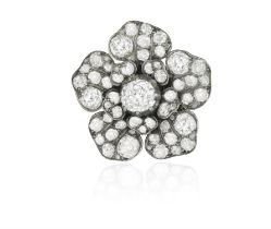 A LATE 19TH CENTURY DIAMOND BROOCH, REMODELLED AS A DRESS RING Designed as a flowerhead set