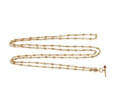 A GOLD ALBERT CHAIN WITH CORAL PENDANT The belcher-link chain with knot-link spacers,