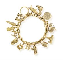 A GOLD CHARM BRACELET The fancy-link chain suspending fifteen charms including a lion, a poodle,