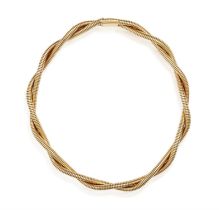 A GOLD NECKLACE, FRENCH, CIRCA 1965 Composed of two interlaced flexible gas-pipe link necklaces,