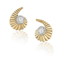 A PAIR OF RETRO DIAMOND EARRINGS Each old cushion-shaped diamond within scrolling reeded frame,