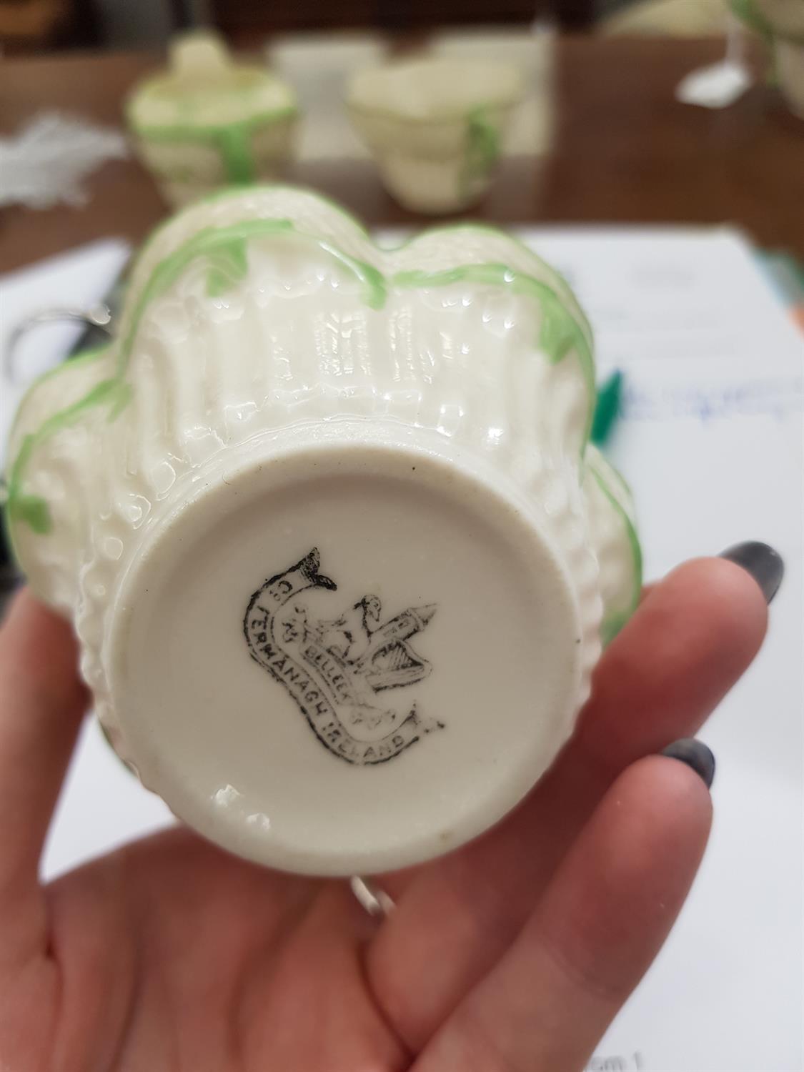 A BELLEEK SECOND PERIOD ERNE PATTERN PART TEA SERVICE decorated with green paint foliate sprays, - Image 16 of 24