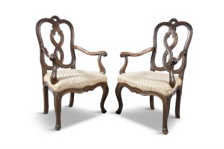 TWO WALNUT FRAMED OPEN ARMCHAIRS, 18TH CENTURY, PROBABLY DUTCH, with intertwined splat backs,