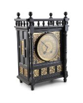 AN EBONISED CASED AESTHETIC PERIOD MANTLE CLOCK, in the manner of Lewis F Day,